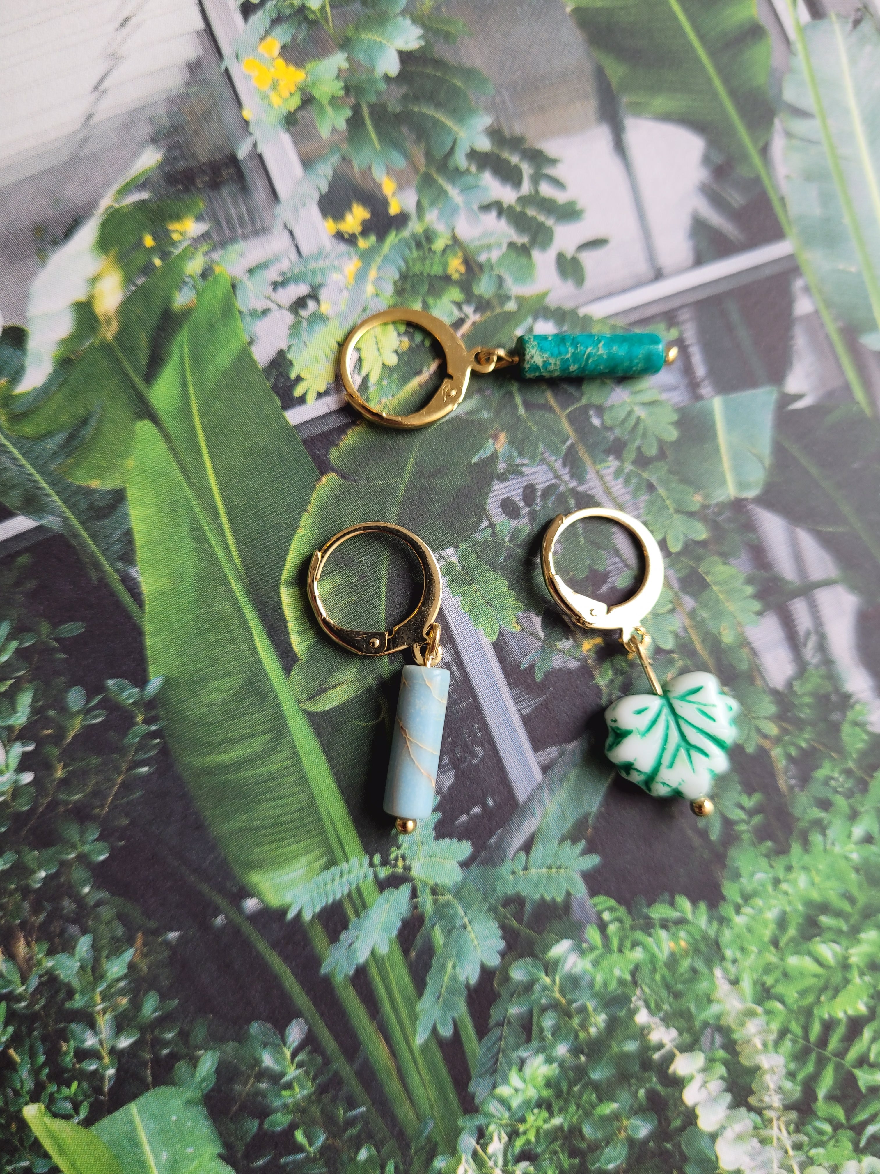 Oorringen huggie | goud en zilver | Leaf