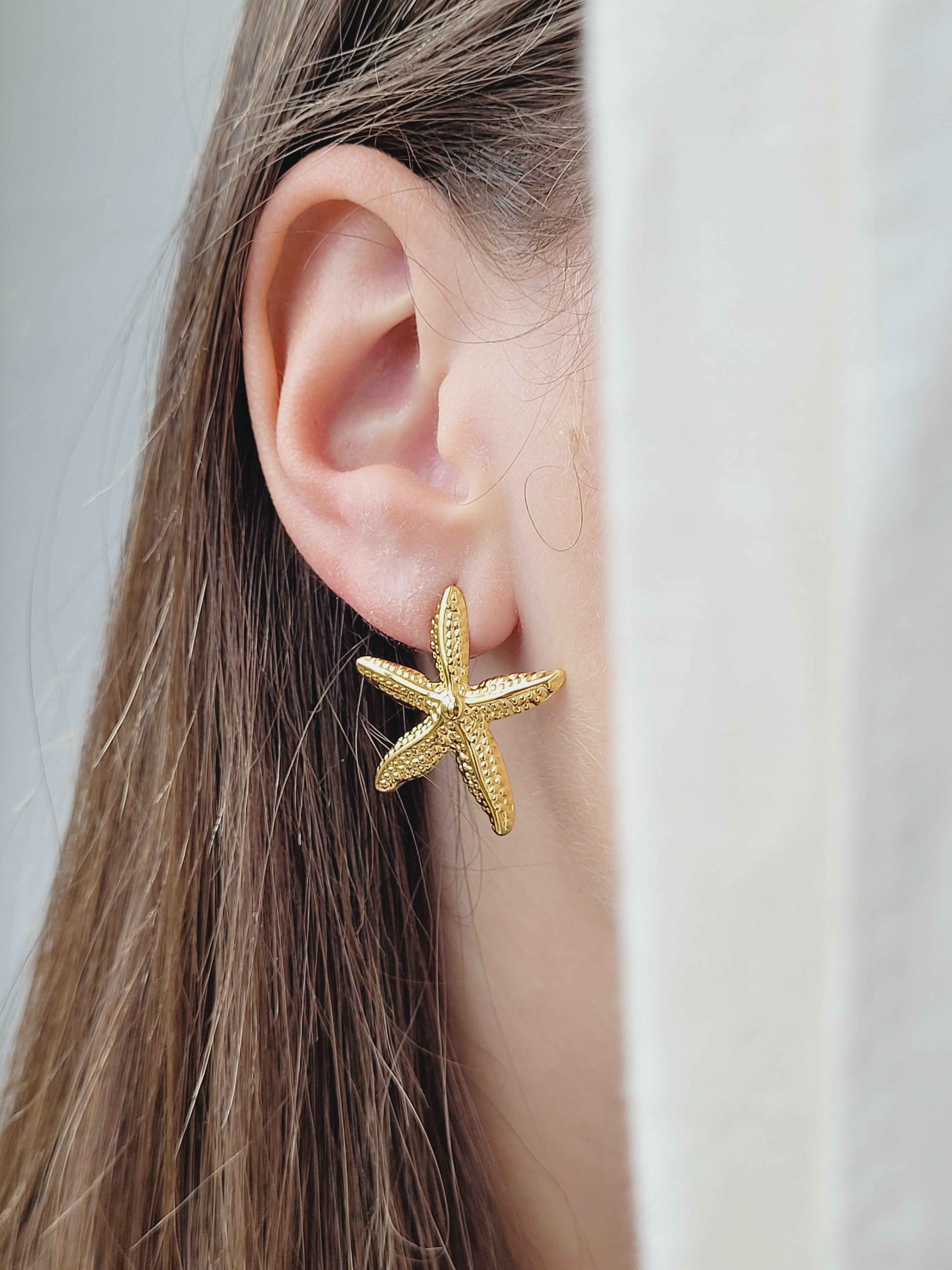Gouden oorbellen Zeester